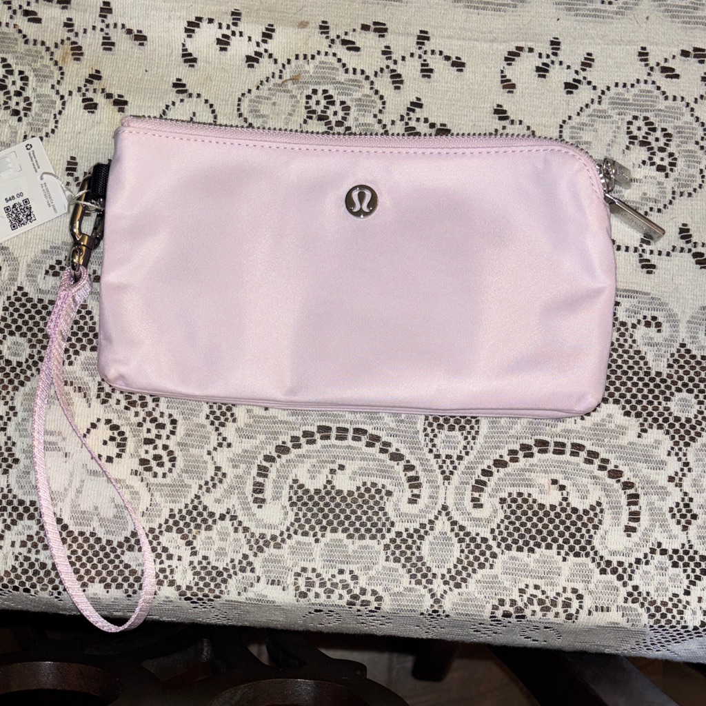 Lululemon Curved Wristlet Water-Repellent Interior Slots For Cards.